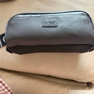 NWT Penguin toiletry bag with travel bottle